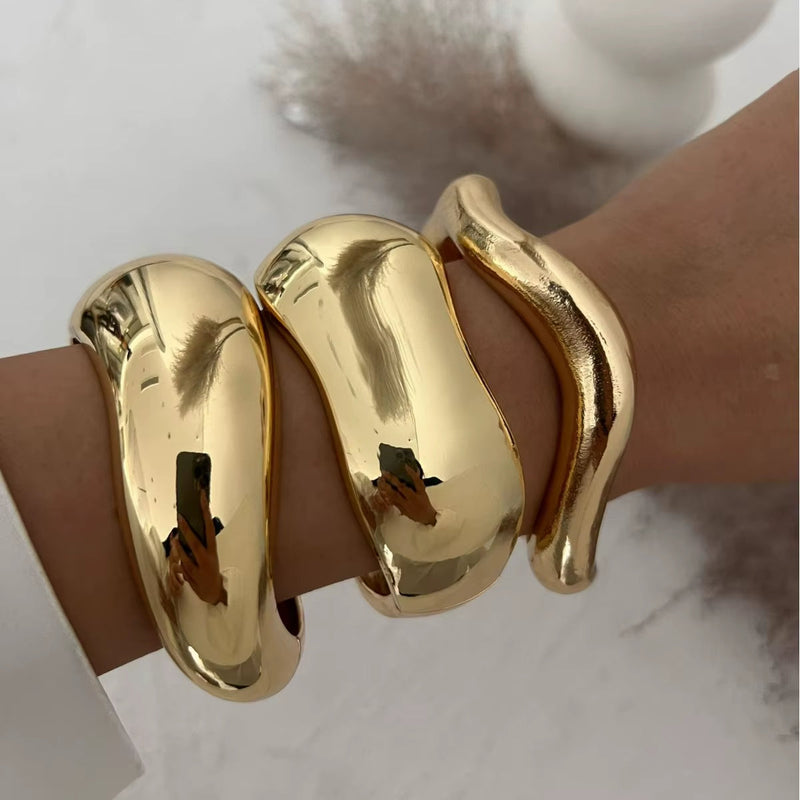 Punk Vintage Irregular chunky glossy gold cuff bangles on wrist