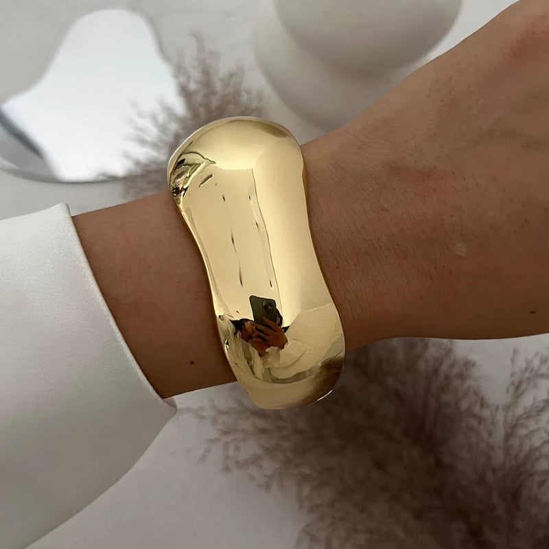 Punk Vintage Irregular shiny gold chunky cuff bracelet on wrist