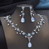 Silver plated Rhinestone Water Drop necklace and earrings set with blue floral accents and crystal detailing