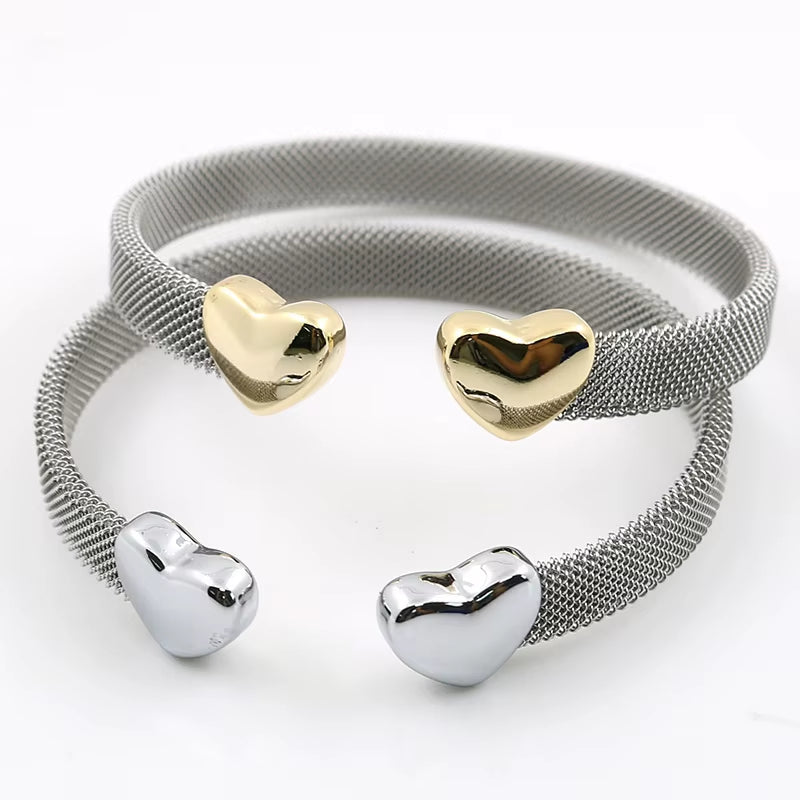 vintage stainless steel bracelets with gold and silver heart ends