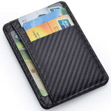 Mens slim minimalist black carbon fiber texture wallet with credit cards inserted