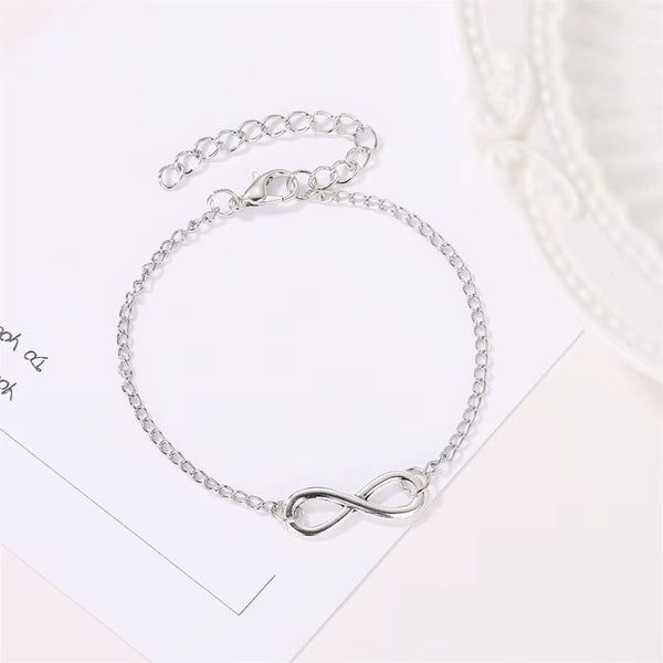 Golden silver color infinity bracelet with adjustable chain and number 8 charm for women