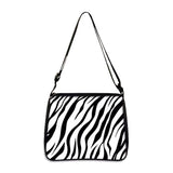 Black and white zebra print small shoulder bag with adjustable strap