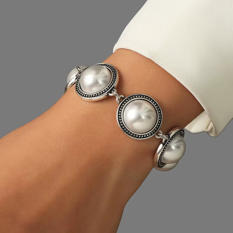 Fashion Boho Vintage round pearl bracelet with silver accents on wrist