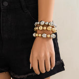 Goth vintage big CCB chain bracelets in gold and silver on wrist
