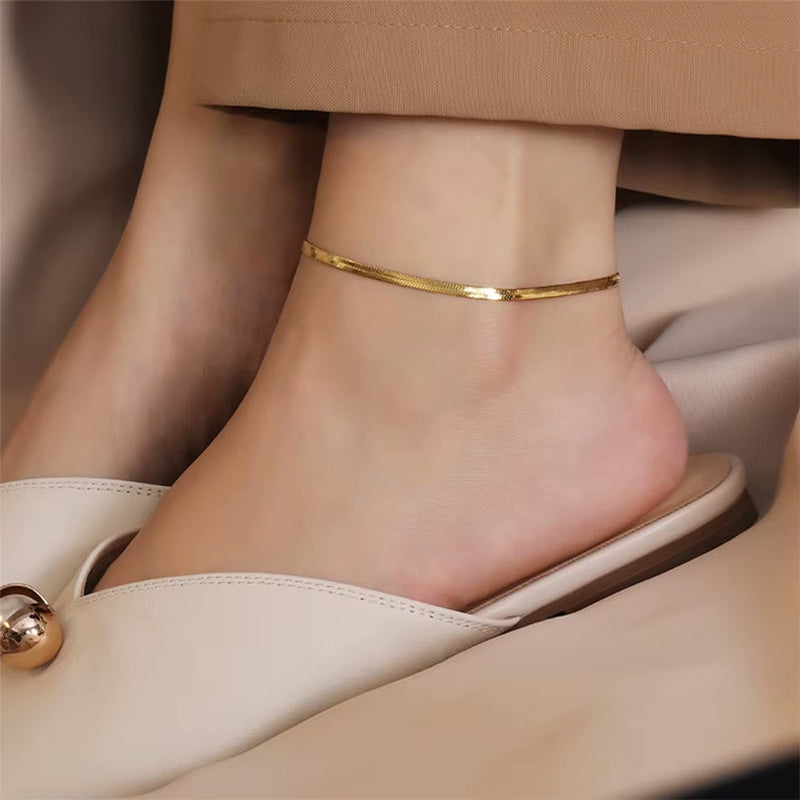 316L stainless steel gold anklet on ankle with beige shoes