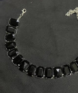 Big Rectangle Stone black rhinestone bracelet with rectangular crystals and silver chain clasp on black background