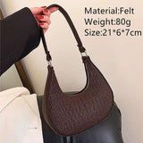 Brown felt ball purse for teenagers with textured design and shoulder strap, 21x6x7cm size.