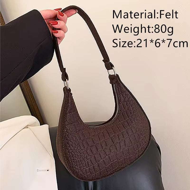 Brown felt ball purse for teenagers with textured design and shoulder strap, 21x6x7cm size.