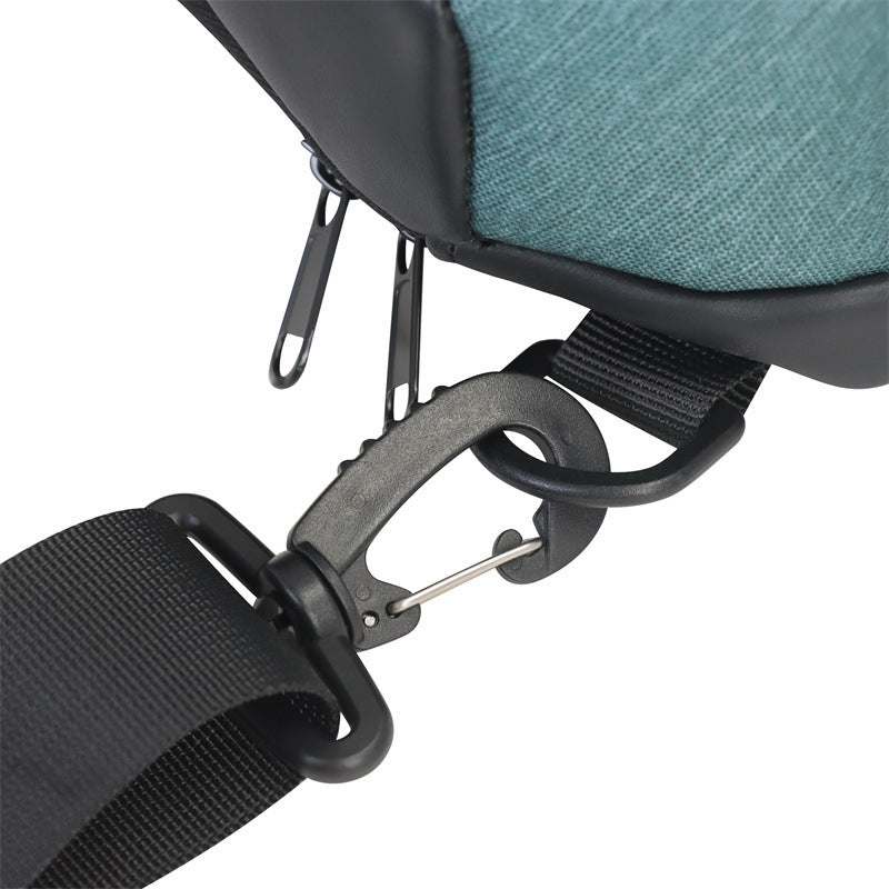 Close-up of black strap and metal clasp on waterproof sling bag made of 900D Oxford cloth and PU leather