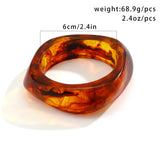 Vintage colorful irregular acrylic resin bracelet in transparent brown orange, 6cm diameter, 68.9g weight