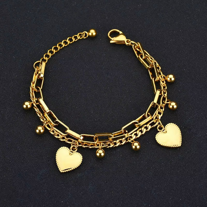 Nextvance Chain Link gold bracelet with heart charms and stainless steel design for women
