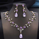 Rhinestone Water Drop bridal necklace and earrings set with purple crystals and gold plating
