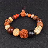 Nature Bodhi 18 Style Beads Bracelet with Rudraksha and natural wooden beads on black background