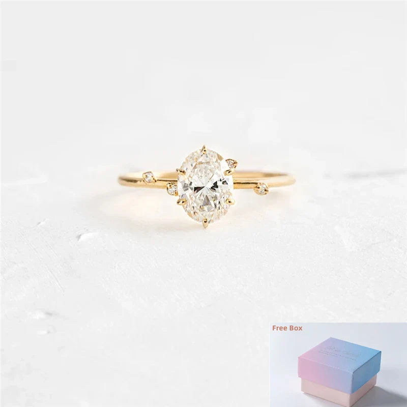 Elegant geometry egg shape crystal gold ring with zircon stone on white background