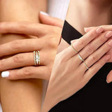 Elegant stackable gold rings with cubic zirconia on female hands