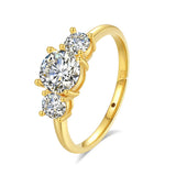 18K gold ring with three round white moissanite stones and AU750 stamp