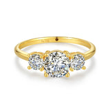 18K gold ring with three white moissanite stones in round cuts
