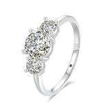 18K white gold ring with three round natural moissanite stones and AU750 stamp