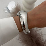 Punk Vintage Irregular chunky silver cuff bangle bracelet on wrist