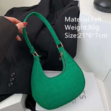 Green felt ball purse for teenagers with adjustable strap and compact design