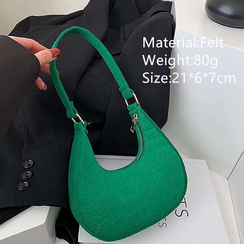 Green felt ball purse for teenagers with adjustable strap and compact design
