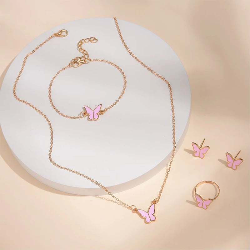 Butterfly pendants necklace set with bracelet, ring, and earrings in pink and gold alloy jewelry.