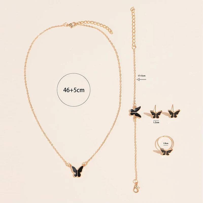Butterfly pendants necklace and matching jewelry set with bracelet, ring, and earrings in black and gold alloy.