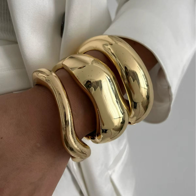 Punk Vintage Irregular chunky glossy gold cuff bangles on wrist