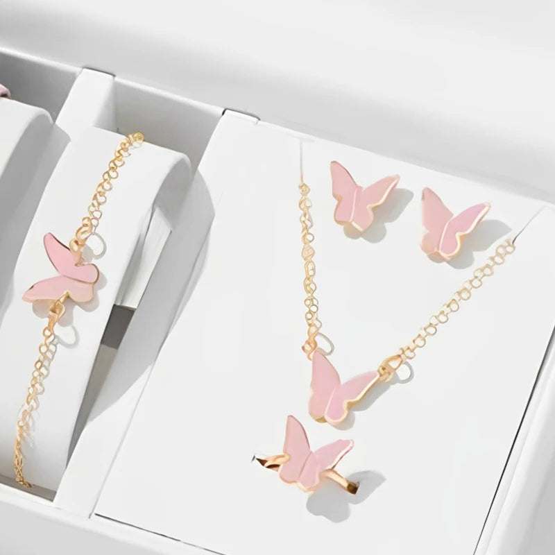 Butterfly pendants necklace set with pink butterfly charms on gold chain including bracelet, earrings, and ring
