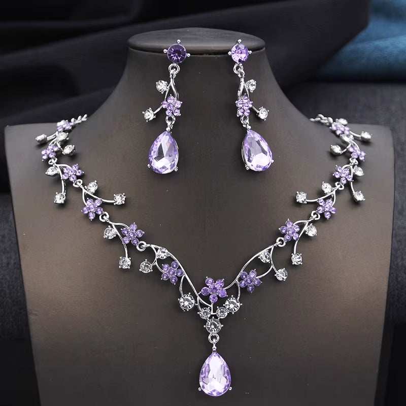 silver plated rhinestone water drop necklace and earrings set with purple crystals