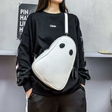 Halloween cartoon ghost shaped white crossbody bag worn with black outfit