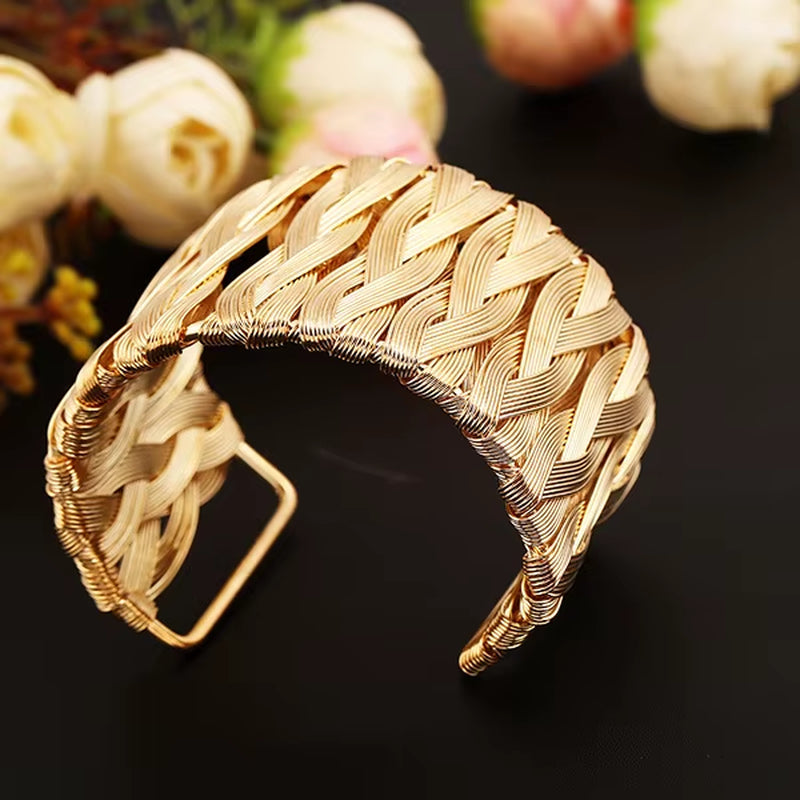 Gold punk style cuff bangle with woven design and wide cuff for women