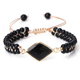 Black onyx natural stone beads bracelet with gold diamond centerpiece and adjustable cord closure
