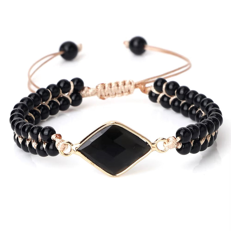 Black onyx natural stone beads bracelet with gold diamond centerpiece and adjustable cord closure