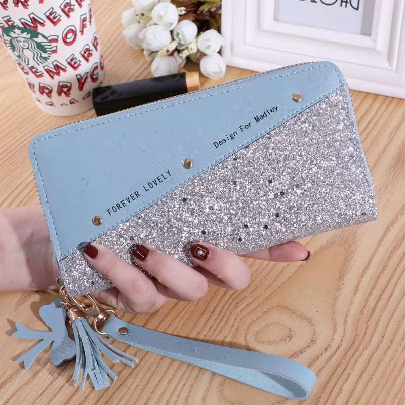Fashion womens PU leather glitter wallet with tassel wrist strap and blue accent