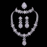 Cubic Zirconia Tassel Drop bridal jewelry set with necklace, earrings, ring, and bracelet in silver tone