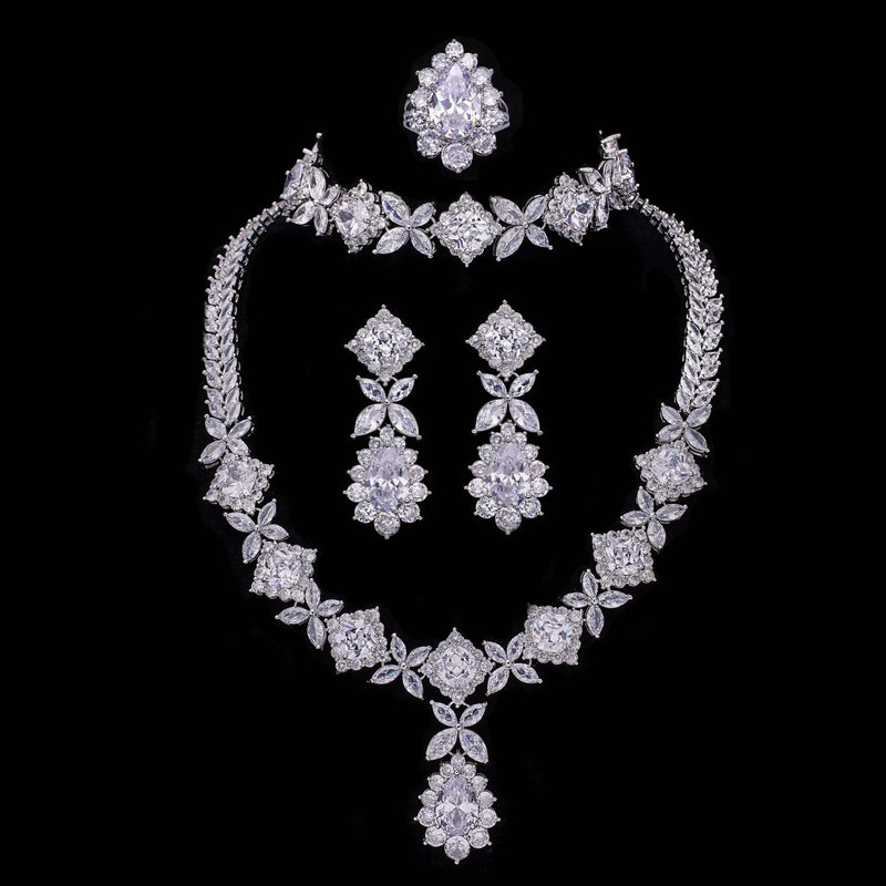 Cubic Zirconia Tassel Drop bridal jewelry set with necklace, earrings, ring, and bracelet in silver tone