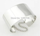 Metallic silver cuff bracelet with chain attachment for adjustable fit