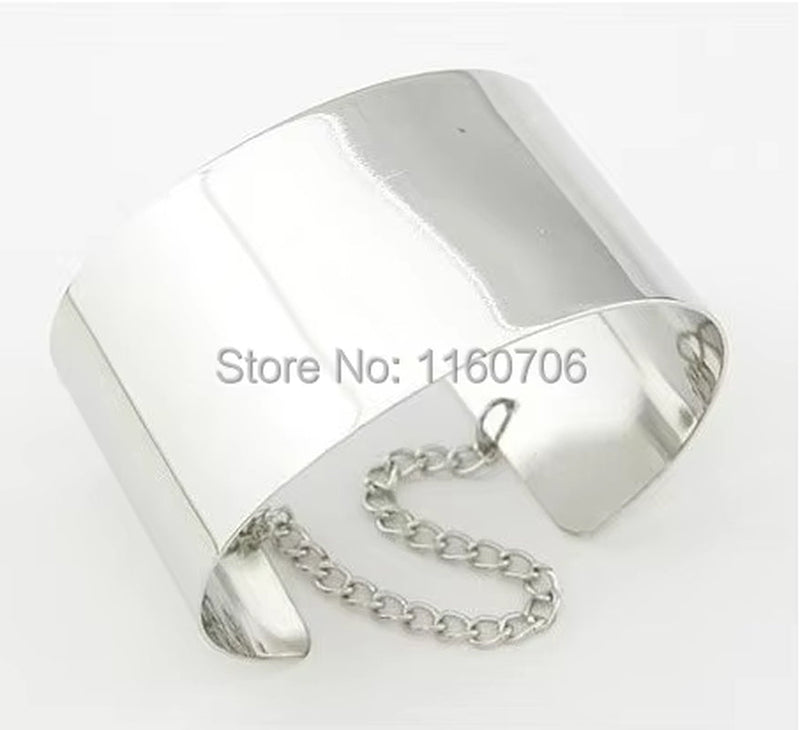 Metallic silver cuff bracelet with chain attachment for adjustable fit